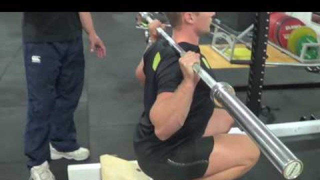 'Charles Poliquin - Quad squats for lower body hypertrophy'