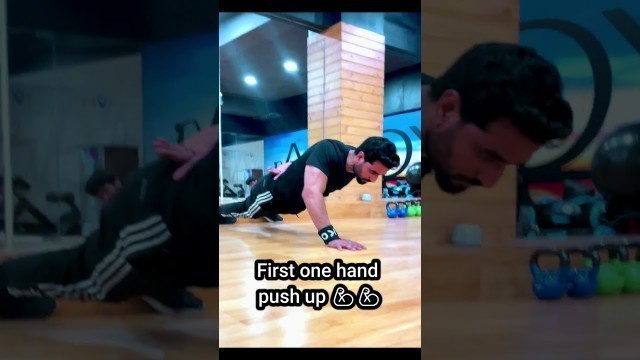 'first one hand push up  