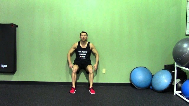 'Wall Sit - HASfit Squat Exercise Demonstration - Wall Squat Form - Isometric Leg Exercise'