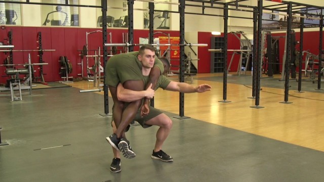 'U.S. Marine Corps  Fitness - Buddy Squat'
