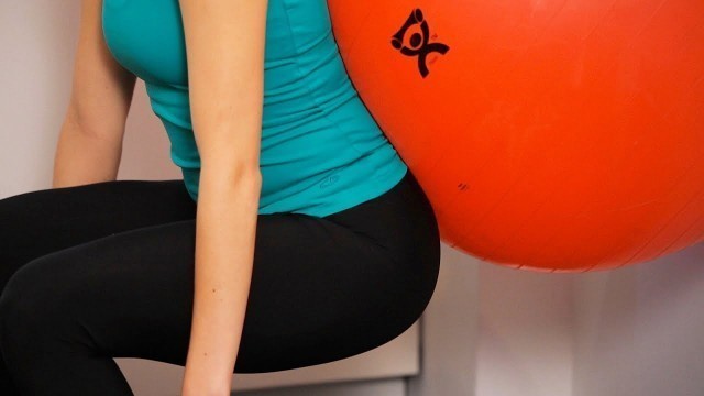 'How to Do a Wall Squat with Exercise Ball | Knee Exercises'