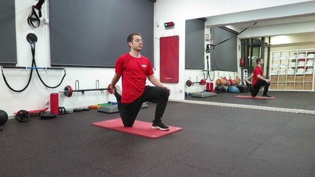 'KNEELING QUAD STRETCH - WIN FITNESS CLUBS'